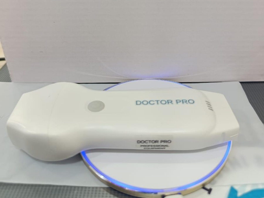 Doctor Pro 2203CL handheld ultrasound on its charging base